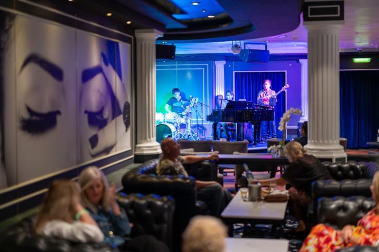 Enjoy live performances at the piano bar
